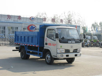 東風小霸王密封自卸式垃圾車